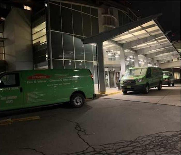 SERVPRO trucks in front of commercial property 